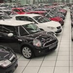 Competencia multa con 171 millones a 21 marcas de automóviles