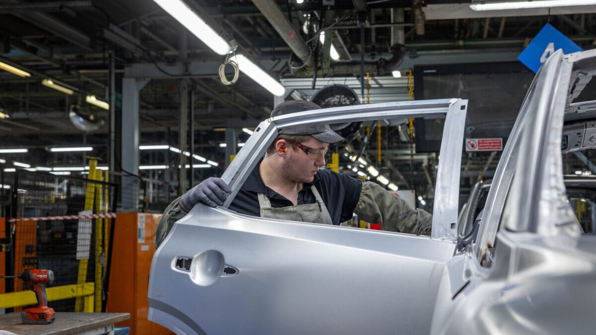 Qashqai being inspected by an operator in the Nissan Sunderland Body Shop Qashqai being inspected by an operator in the Nissan Sunderland Body Shop